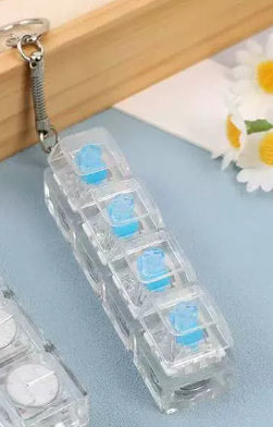 Mechanical Keyboard With Light Pressing Keychain