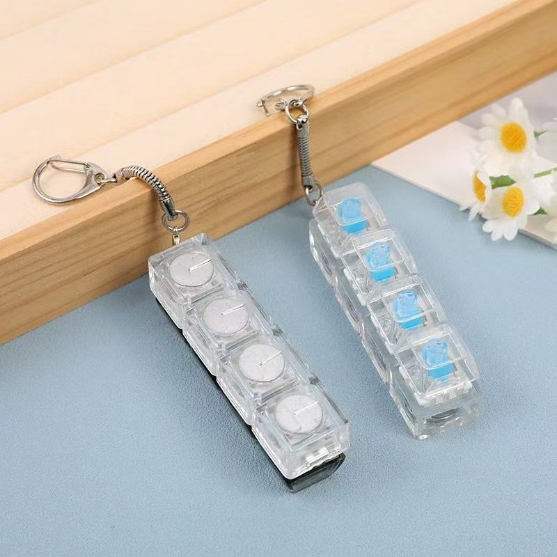 Mechanical Keyboard With Light Pressing Keychain